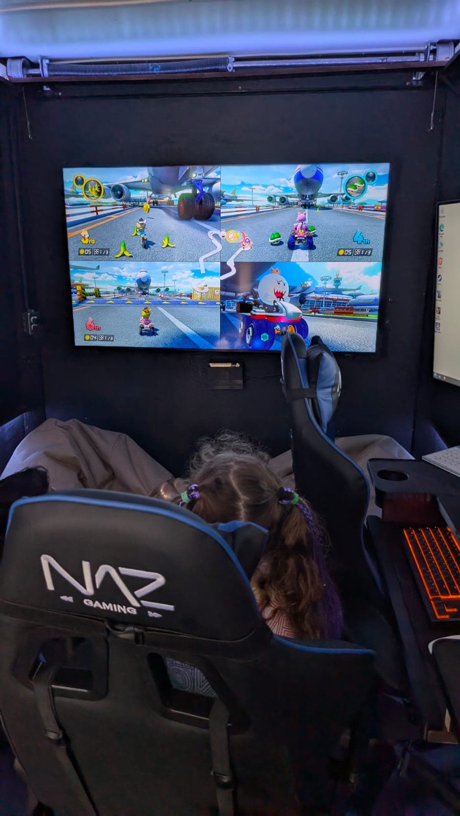 Kid enjoying the gaming trailer