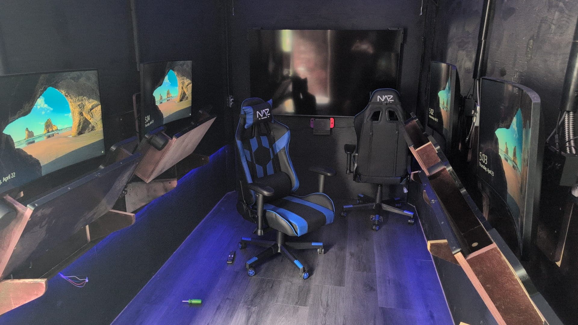 Inside the gaming trailer with chairs set up